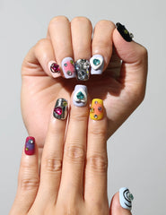 Close-up of Y2K style coffin nails with abstract art and gems – Singapore press on nails by naillover