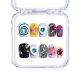 Colorful coffin-shaped Singapore press on nails with heart gems and abstract patterns – handmade press on nails by naillover