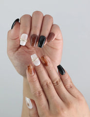 Model wearing Blend Black handmade press on nails from Naillover, perfect for elegant and trendy everyday looks.