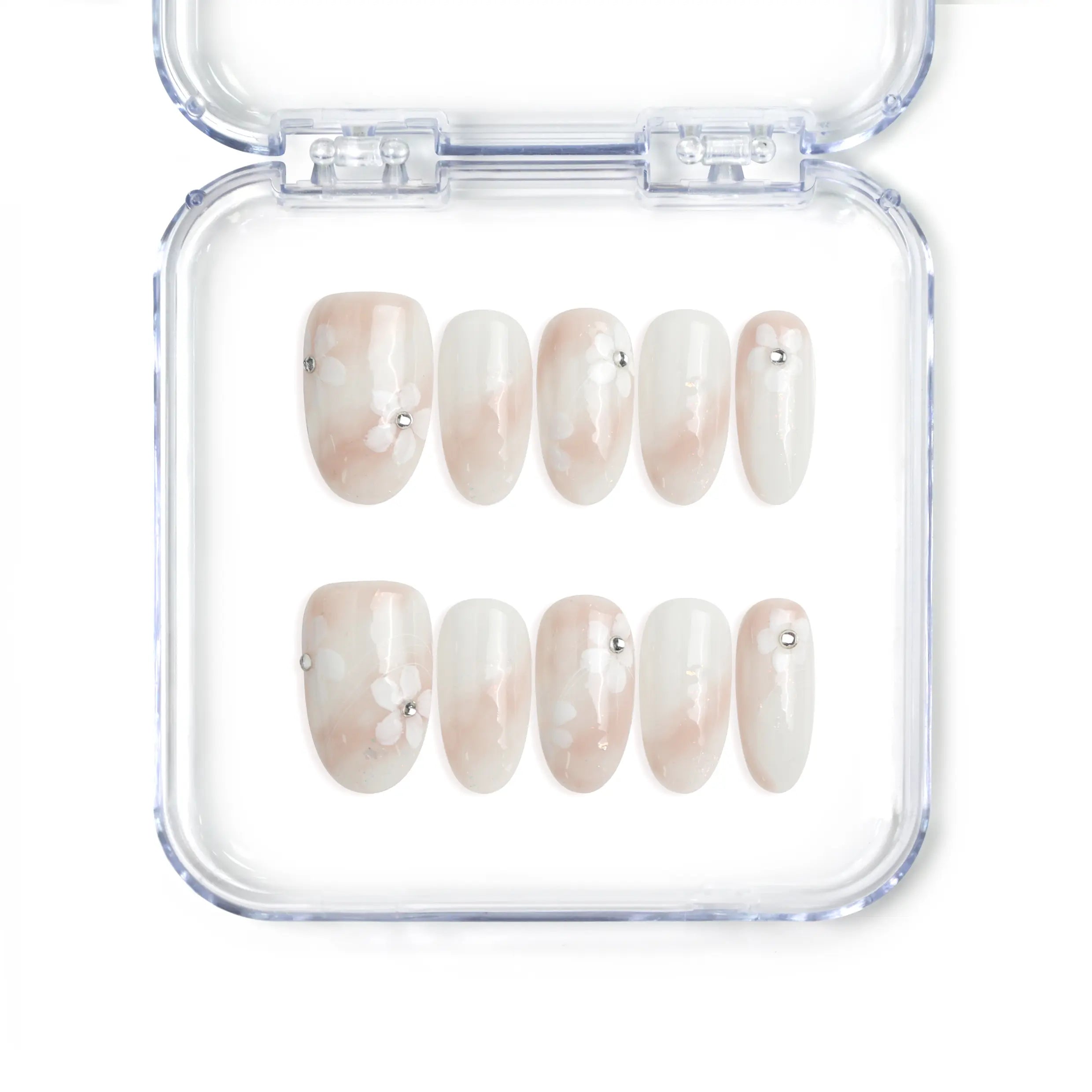 Singapore handmade press on nails with sheer base and delicate white and pink floral nail art by Naillover