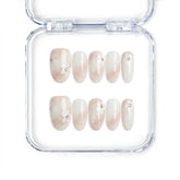 Singapore handmade press on nails with sheer base and delicate white and pink floral nail art by Naillover