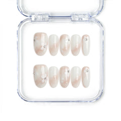 Singapore handmade press on nails with sheer base and delicate white and pink floral nail art by Naillover