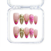 Naillover Singapore handmade pink press on nails featuring gold shimmer, 3D flower nail art, stars, and pearl accents