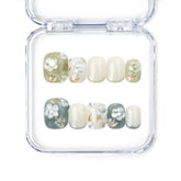 Singapore handmade press on nails with 3D white flowers, olive base, and French fade design by Naillover