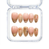 Naillover Blush Amber Grace handmade press on nails in peach and beige marble with subtle gold accents from Singapore press on nails collection.