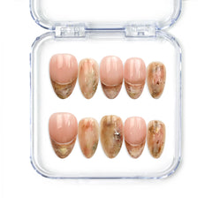 Naillover Blush Amber Grace handmade press on nails in peach and beige marble with subtle gold accents from Singapore press on nails collection.