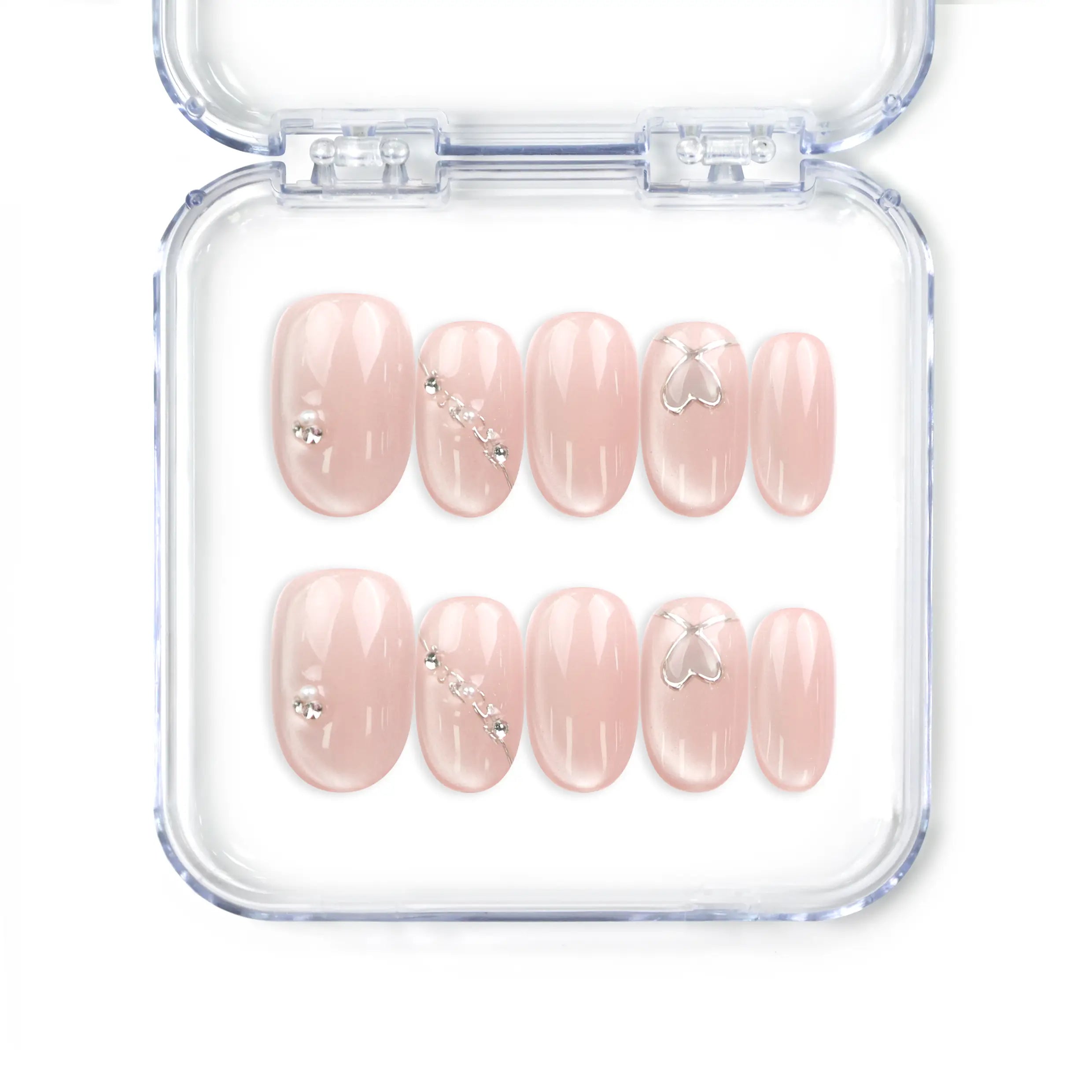 Blush Gleam Cat Eye Singapore press on nails by naillover, handmade press on nails with silver accents and shimmering cat eye finish.