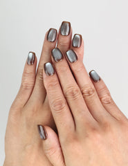 Model wearing Naillover Bronze Fantasy Singapore press on nails with shimmering bronze finish