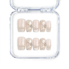 Butterfly Grace Singapore handmade press on nails featuring soft pink and white gradient with holographic butterfly and floral details by Naillover