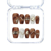 Naillover Caramel Luxe handmade Singapore press on nails in warm caramel and soft gold with elegant swirl details.