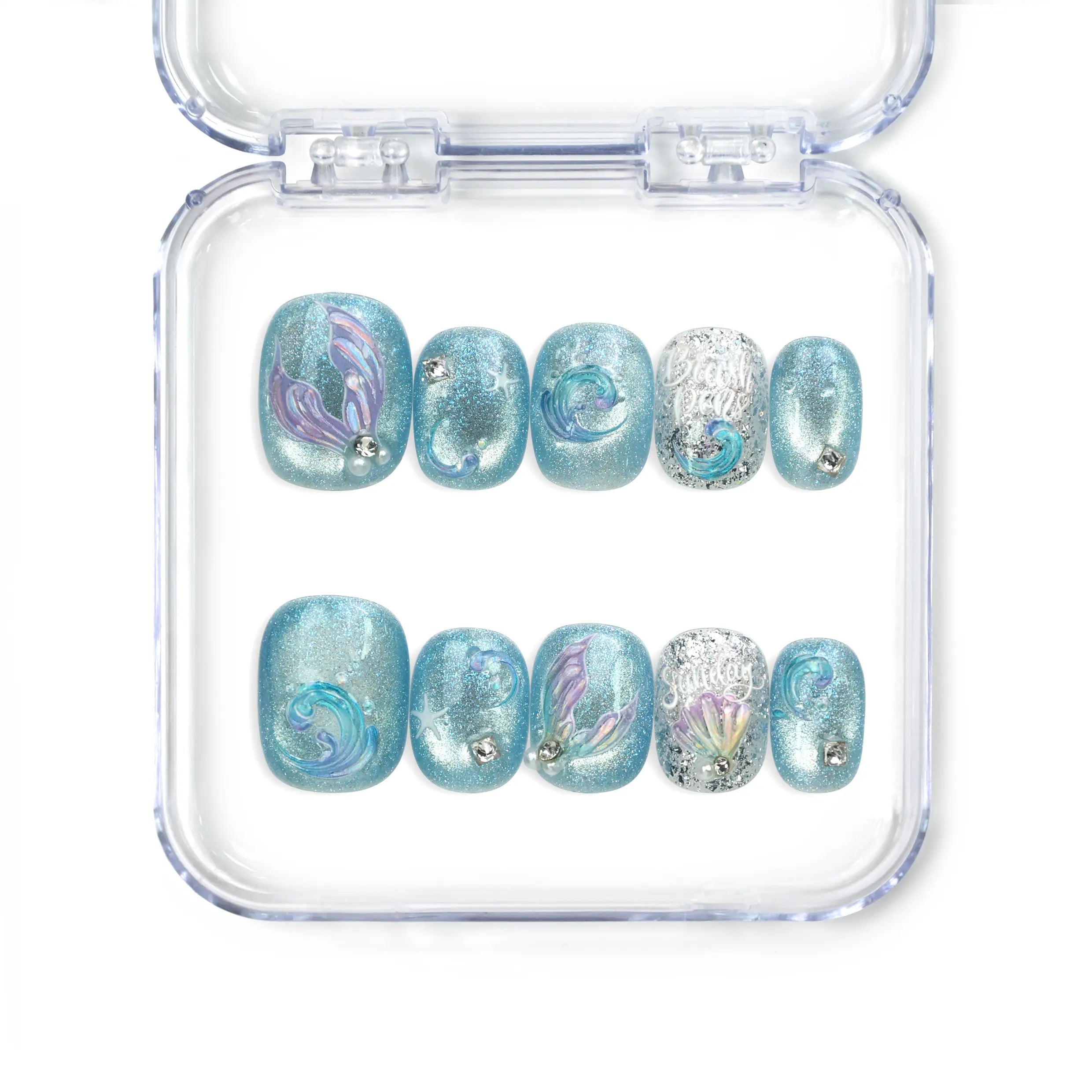 Naillover Celestial Blue handmade press on nails featuring swirling blue patterns, shimmering textures, and metallic accents from Singapore press on nails collection.