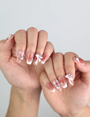 Medium coffin Cherry Bow Crush handmade press on nails worn on both hands, showing gingham pattern and bow details by naillover