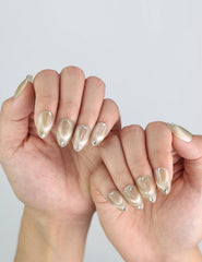 Natural light view of Clean Sand short almond nails by Naillover, emphasizing clean and simple elegance.