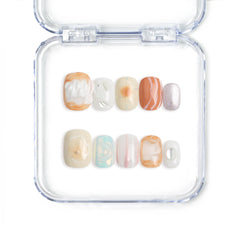 Singapore handmade coral-inspired press on nails in tropical peach and seafoam tones by Naillover