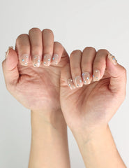 Crystal Dust nude short Singapore press on nails styled for office chic and timeless glamour