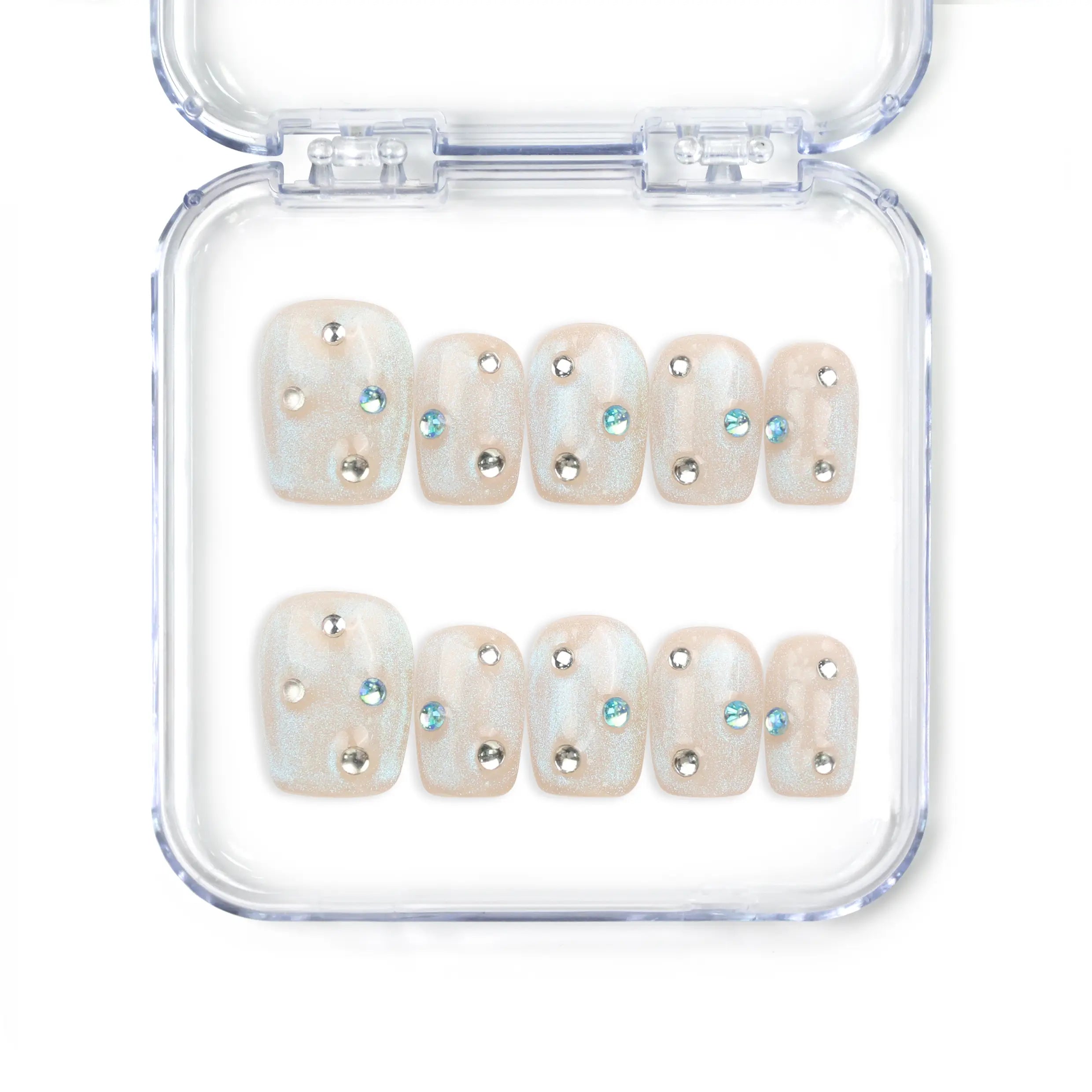 Crystal Dust nude short Singapore press on nails with shimmering finish and gem accents, handmade by naillover for a classic and elegant style