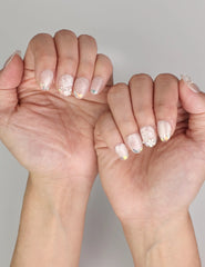 Naillover Crystal Sparkle cat eye nails styled on hand, featuring handmade press on nails with playful iridescent shimmer.