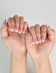 Elegant Dusky Pink Singapore press on nails on model’s hands, glossy finish and simple nails style by naillover