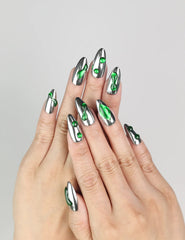 Model wearing Emerald Wave handmade press-on nails Singapore, showcasing mirror silver base and emerald wave design by naillover