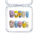 Coffin-shaped handmade press-on nails with 3D Bubu charms, flowers, bows, and pastel gingham, from Singapore brand Naillover.