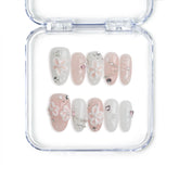 Naillover handmade Singapore medium pink oval press on nails with 3D flower nails art, rhinestones, and heart accents