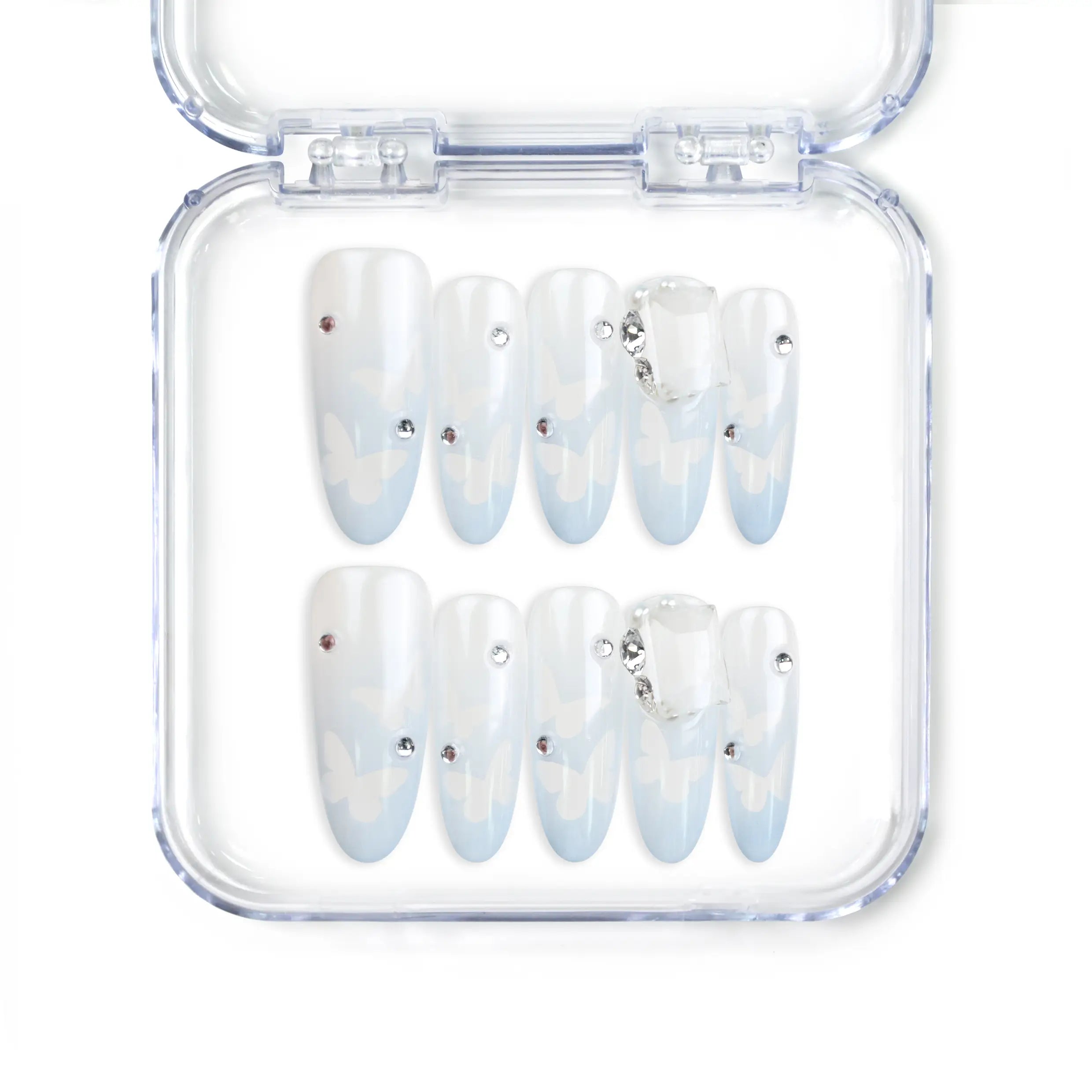 Close-up of Frost White Singapore press-on nails with silver glitter accents, handmade by naillover