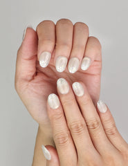 Close-up of Naillover Frosty Glitter Singapore press on nails showing elegant glitter finish on sheer base.