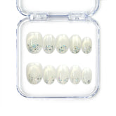 Naillover Frosty Glitter handmade press on nails with sheer base and shimmering silver glitter from Singapore press on nails collection.