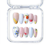 Handmade pink almond press on nails with floral art and fruit motifs, from Singapore brand Naillover