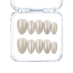 Naillover Glimmer Dust short almond handmade press on nails with golden shimmer and geometric accents, Singapore style.