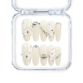 Glimmer Mirage translucent handmade Singapore press-on nails with silver glitter and butterfly accents by naillover