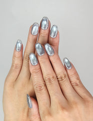 Model wearing Naillover Glinting Gray cat eye press on nails, metallic grey shimmer design, Singapore handmade nails