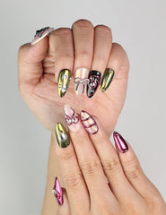 Close-up of Glossy Love coquette nails with heart and bow designs, trendy handmade press on nails Singapore.