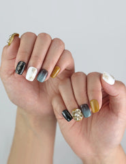 Golden Bloom Singapore press on nails worn on hand, showcasing nature-inspired autumn colors and elegant 3D detailing.