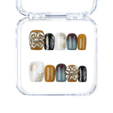 Naillover Golden Bloom handmade Singapore press on nails with brown, ivory, and 3D golden floral details in a short coffin shape.