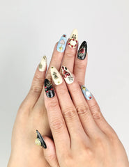 Model wearing Gothic Blossoms handmade Singapore press on nails with metallic roses and rhinestones, elegant and trendy by naillover