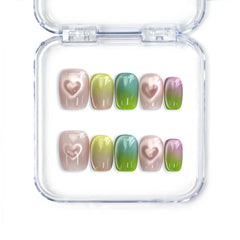 Gradient heart handmade press on nails in pastel colors with cat-eye heart details by naillover, Singapore press on nails