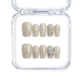 Singapore handmade short square press on nails in ivory with silver flower art by Naillover