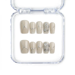 Singapore handmade short square press on nails in ivory with silver flower art by Naillover
