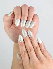 Close-up of Naillover handmade Jade Curve Singapore press on nails, featuring almond shape and green glow.