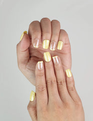 Side view of Lemon Zest handmade press on nails in cheerful yellow-pink ombre, trendy summer cute nails