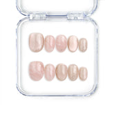 Full set of Naillover Mellow Marble Singapore press on nails featuring pink and white marbled design with subtle shimmer.