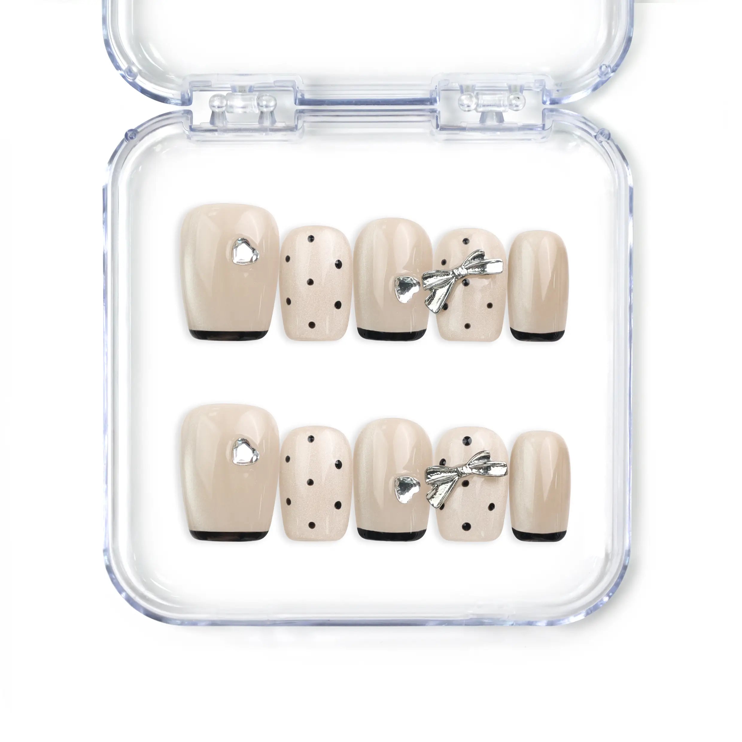 Naillover Midnight Bow handmade Singapore press on nails in beige and black with dots and metallic silver ribbons, short length