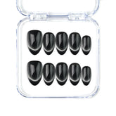 Naillover Midnight Gaze handmade Singapore press on nails in sleek black with soft cat eye shimmer and almond shape.