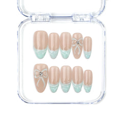 Naillover Mint Chic handmade Singapore press on nails with nude base, mint green gradient tips, and pearl bow accents.
