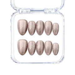 Naillover Mocha Gleam handmade Singapore press on nails in short almond shape with mocha brown cat-eye shimmer finish.