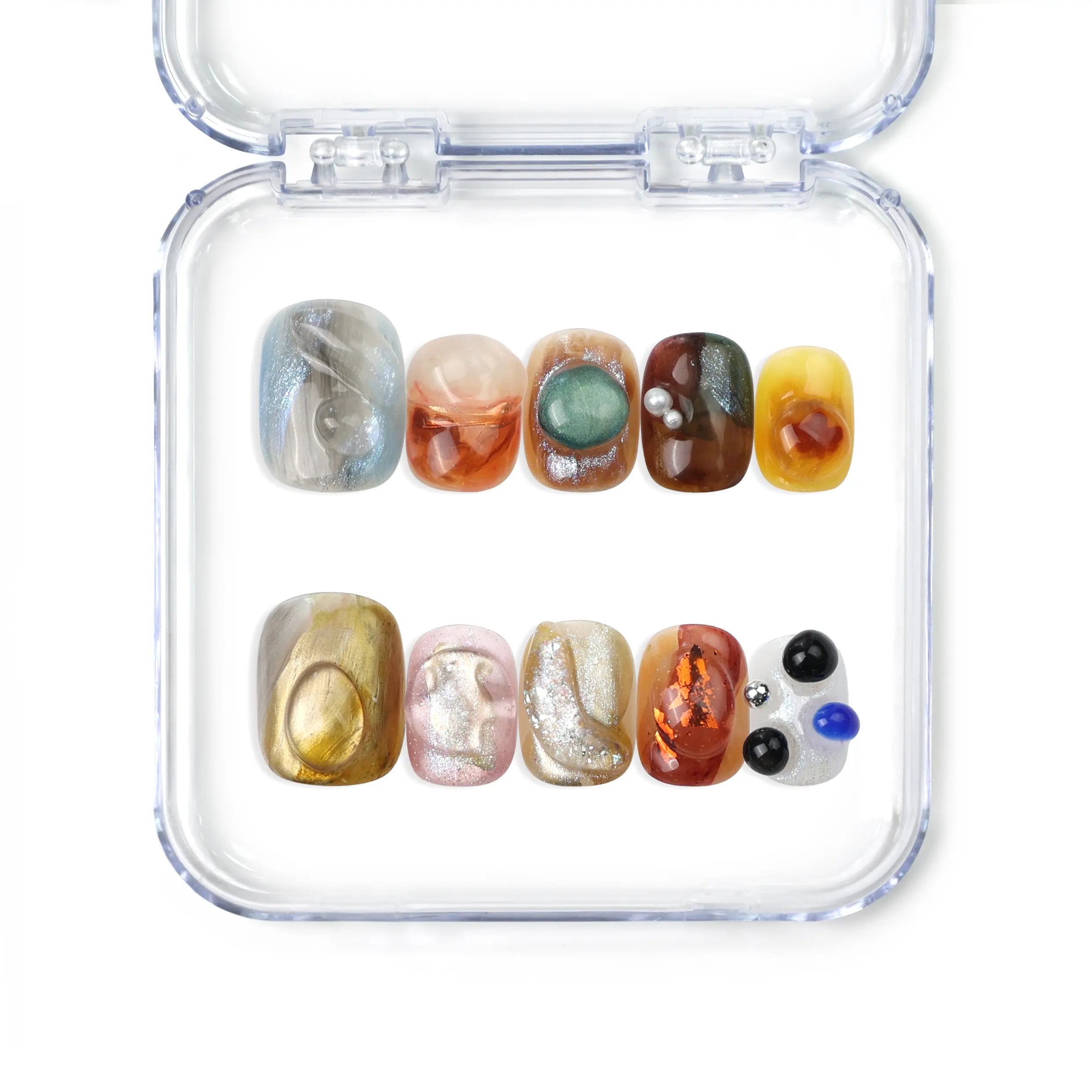 Naillover Amber Whisper handmade press on nails featuring earthy amber and olive tones with a glossy finish, from our Singapore press on nails collection.