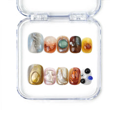 Naillover Amber Whisper handmade press on nails featuring earthy amber and olive tones with a glossy finish, from our Singapore press on nails collection.