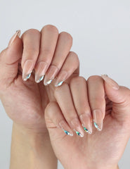 Side view of Aqua Gem nails — sparkling blue-tipped handmade press on nails from Naillover's SG collection.