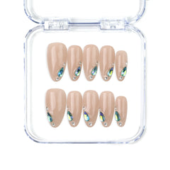 Naillover handmade press on nails with nude base and blue gem tips — Aqua Gem from the Singapore press on nails collection.